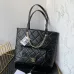 10CHANEL Calfskin Quilted Pocket Shopping Tote Black #A49154