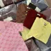 9Gucci Short-Sleeve Knit Top with Gold Buttons #A46445